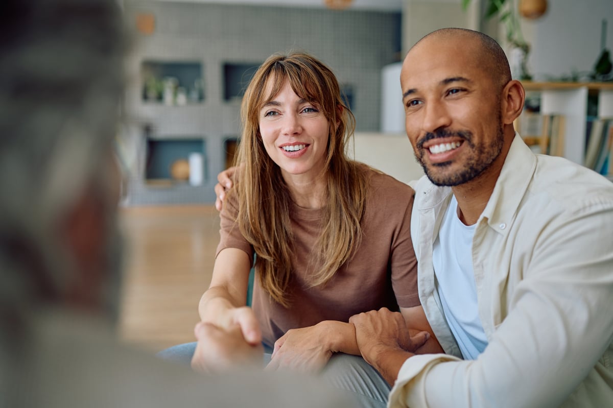 A consultant reviewing financial information with clients